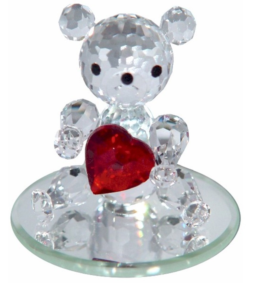 PR63570 - Teddy bear sitting on mirror and holding a heart